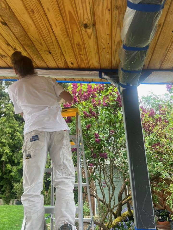 Rhen, owner of Northline Paint & Finish, actively working on a finish project